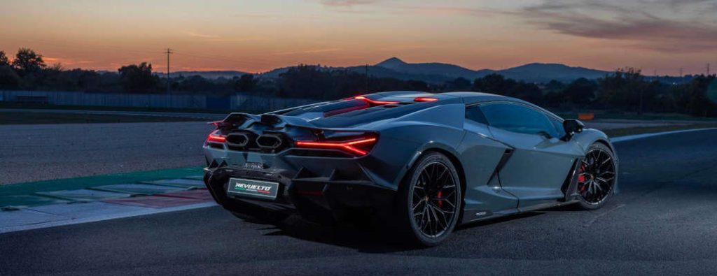 A rear quarter exterior view of the 2025 Lamborghini Revuelto
